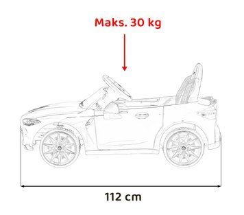 Автомобіль BMW M4 жовтого кольору
